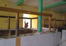 Dan una pintadita a mercado de Acanceh